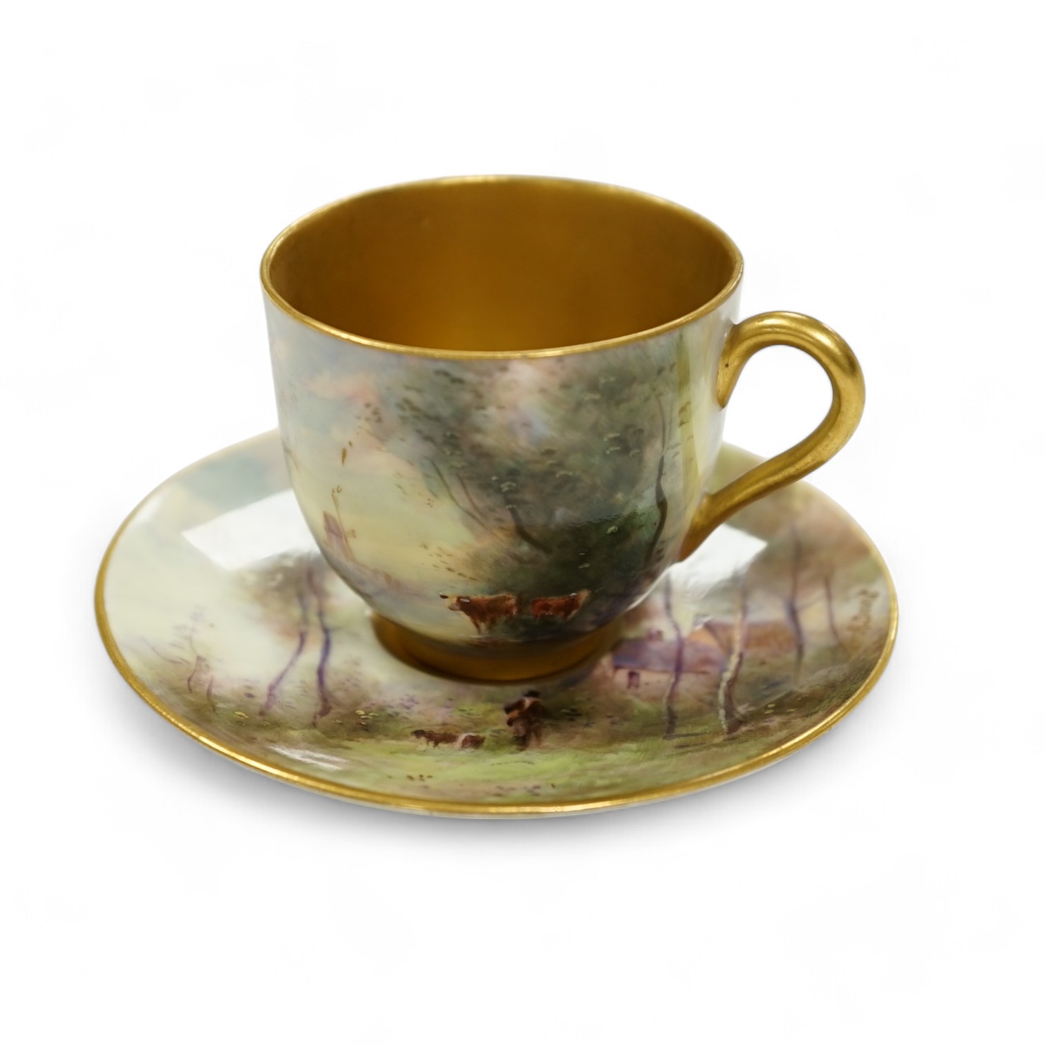 A Royal Worcester cup and saucer, painted by Harry Davis with figures in a landscape, saucer 9.5cm diameter. Condition - good